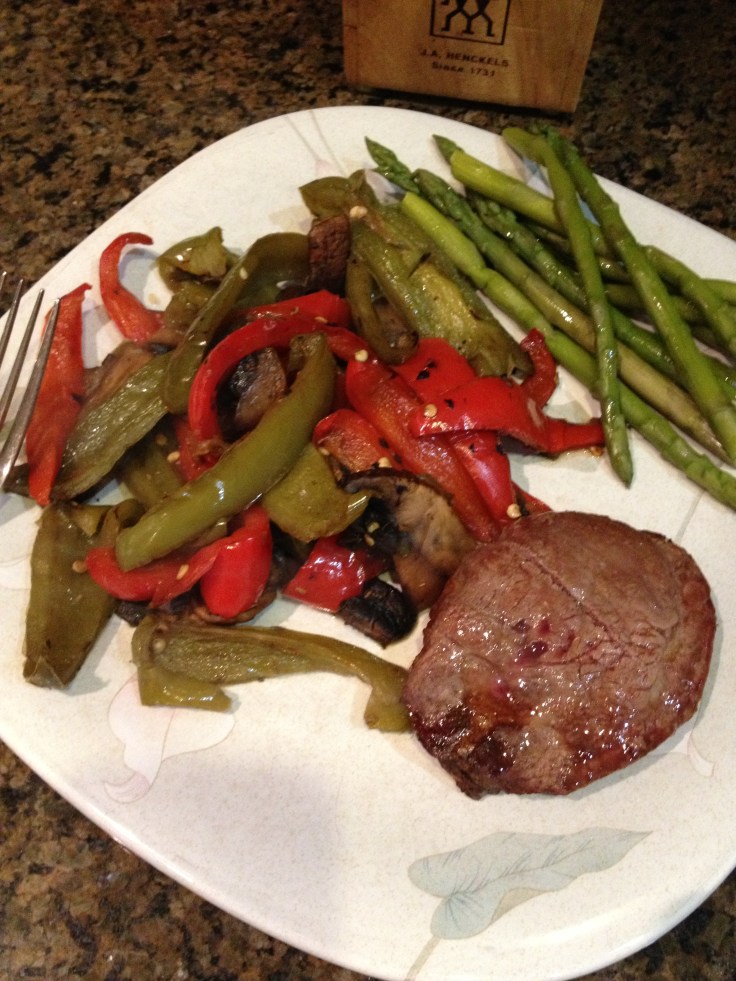 A lean burger, along with peppers and asparagus.