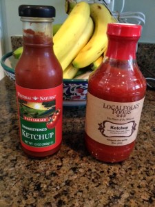 I've found two brands of low-sodium,low-sugar ketchup, Westbrae and LocalFolks Foods.