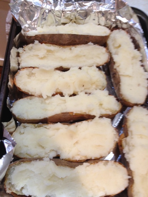 Once the consistency you want, spoon into your potato skins and broil a few minutes to brown the tops.