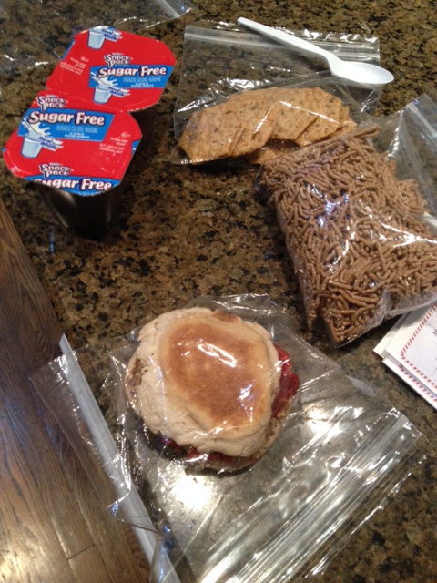 My take-along healthier movie snacks include sugar-free pudding, high fiber cereal and lite while wheat English muffins.