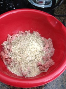 Turkey meatball ingredients in a mixing bowl, just add water and mix it all up.