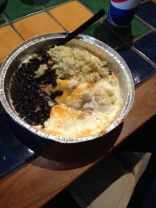 A normal Cafe Mexicali dish, lots of cheese and sauces.