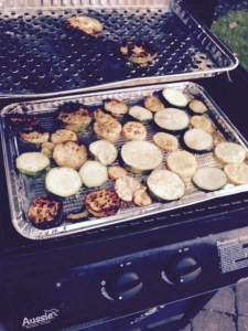 Zucchini on the gas grill, basted with olive oil and Italian spices.
