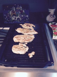 Grilling chicken breasts on my new grill pan.