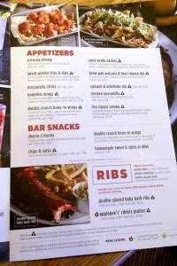 This sample page from a New York Applebee's menu shows too much salt in every appetizer and both rib options, disgusting.